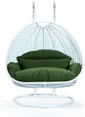 LeisureMod 2 Person Hanging Egg Chair Indoor Outdoor Patio Lounge Swing with White Stand &amp UV-Resistant Cushions Hammock Chair for Bedroom &amp Garden Dark Green