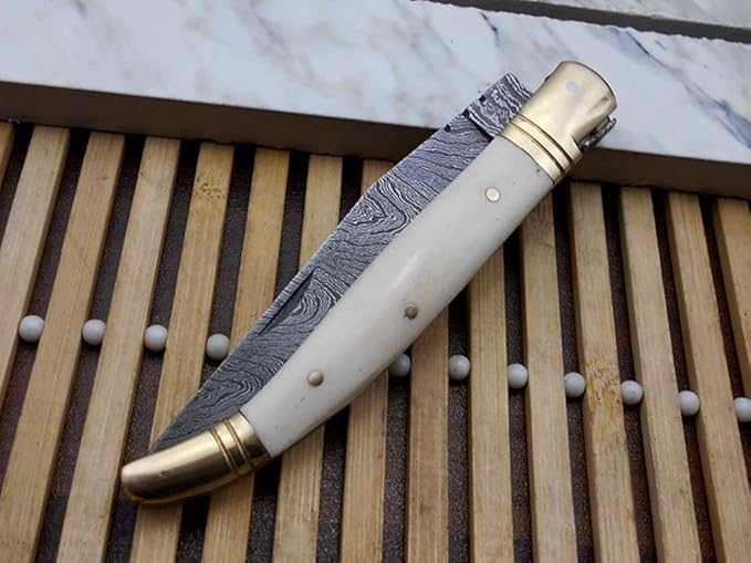 Laguiole Folding Damascus Steel Knife 8.6 Long with 4.1 Hand Forged Custom Twist patren Blade. Wine 2 Tone Dollar Wood &amp Brass Bolster Scale. Cow Hide Leather Sheath Included (White)