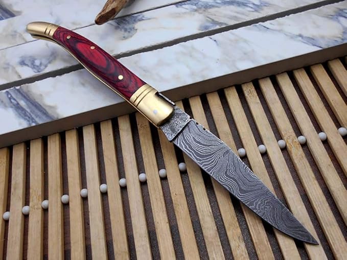 Laguiole Folding Damascus steel knife 8.6 Long with 4.1 hand forged custom twist pattern Blade. 2 Tone Green wood scale with brass bolster. Cow hide leather sheath included (Red)