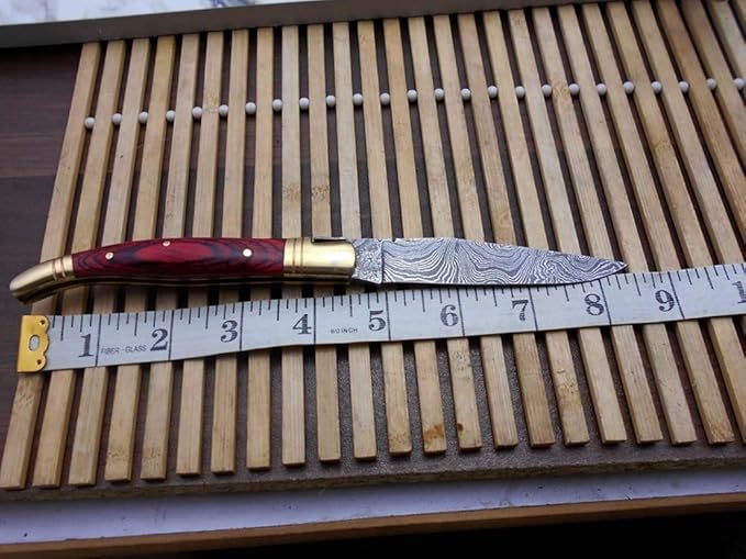 Laguiole Folding Damascus steel knife 8.6 Long with 4.1 hand forged custom twist pattern Blade. 2 Tone Green wood scale with brass bolster. Cow hide leather sheath included (Red)
