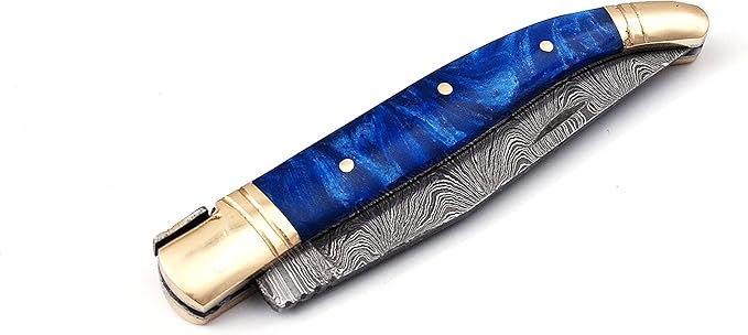 Damascus steel blade Laguiole Folding knife 8.5 Long with 4 hand forged twist pattern Blade. Blue color unshrinkable Raisen scale with brass bolster Cow hide leather sheath