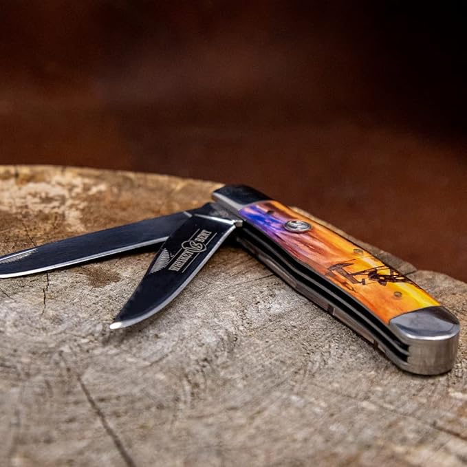 WHISKEY BENT HAT CO. Traditional Trapper Folding Pocket Knife 4.125 Closed Length 440C Stainless Steel Blades (Pump Jack Sunrise)