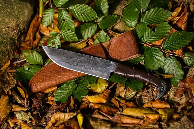 Odin's Raven Norse Viking-styled Knife 10.3 - Hand Forged 6.5 Carbon Steel Blade Raven's Head Hilt and Leather Sheath - Unique Medieval Seax Style - Norse Knife for Hunting &amp Camping