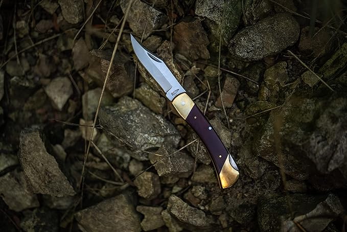 Uncle Henry LB7 Bear Paw Traditional Lockback Pocket Knife with 3.7in Clip Point High Carbon S.S. Blade Wood Handle Brass Bolsters and Leather Belt Sheath for EDC Hunting Camping and Outdoors