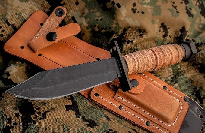 Ontario Knife Company 499 Air Force Survival Knife 5 Sawback Blade with False Top Edge and Blood Grooves Natural Leather Handle and Sheath - 6150 (Color May Vary)Black