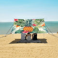ALAZA Tropical Pattern with Pineapples Palm Leaves and Flowers Beach Tent Sun Shelter Portable Canopy Sunshade for Outdoor Camping Picnics Backyard Fun 10x9 ft