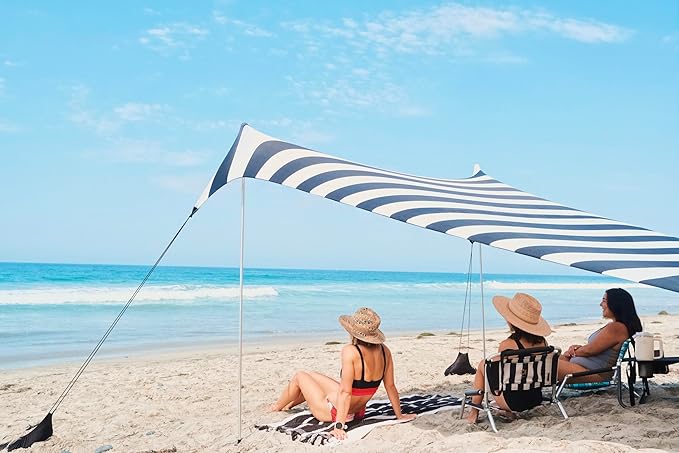 Neso Grande Portable Beach Tent Sun Shelter - Lightweight Beach Shade Canopy - Easy Setup for Family Outings - Patented Reinforced Corners - UPF 50+ Sun Protection