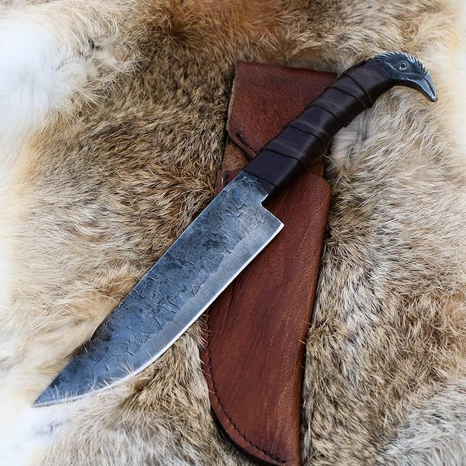 Odin's Raven Norse Viking-styled Knife 10.3 - Hand Forged 6.5 Carbon Steel Blade Raven's Head Hilt and Leather Sheath - Unique Medieval Seax Style - Norse Knife for Hunting &amp Camping