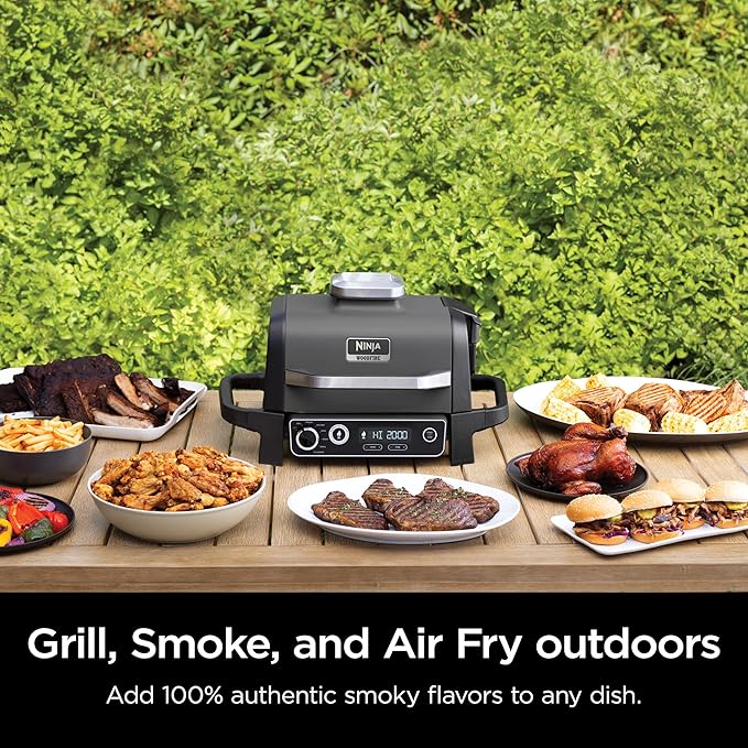 Ninja | Woodfire Series | 7-in-1 (Grill BBQ Roast Air Fry Dehydrate Broil Smoke) | Portable &amp Weather Resistant | Cook Up To 6 Steaks &amp 30 Hot Dogs | Woodfire Pellets included | OG701