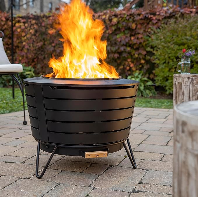 TIKI Patio Smokeless Outdoor Fire Pit 25-Inch Wood-Burning Bonfire with Removable Ash Pan Stand and Weather-Resistant Cover