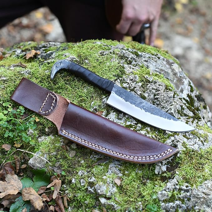 Odin's Raven Norse Viking-styled Knife 10.3 - Hand Forged 6.5 Carbon Steel Blade Raven's Head Hilt and Leather Sheath - Unique Medieval Seax Style - Norse Knife for Hunting &amp Camping