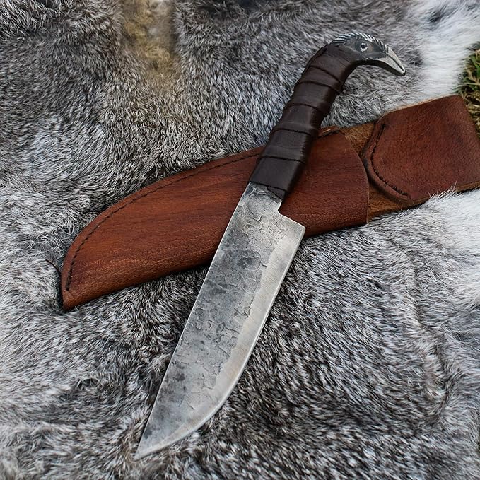 Odin's Raven Norse Viking-styled Knife 10.3 - Hand Forged 6.5 Carbon Steel Blade Raven's Head Hilt and Leather Sheath - Unique Medieval Seax Style - Norse Knife for Hunting &amp Camping