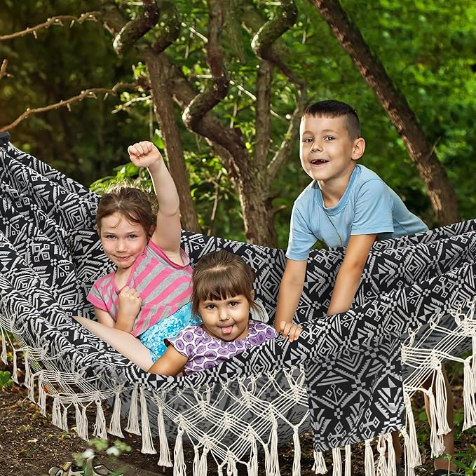 2 Person Hammock with PillowIndoor Hammocks with Portable Carry Bag Deluxe Macrame FringeCurved Spreader BarSide PocketPolycotton FabricUp to 450Lbs for PatioPorchBackyardBeachOutdoor